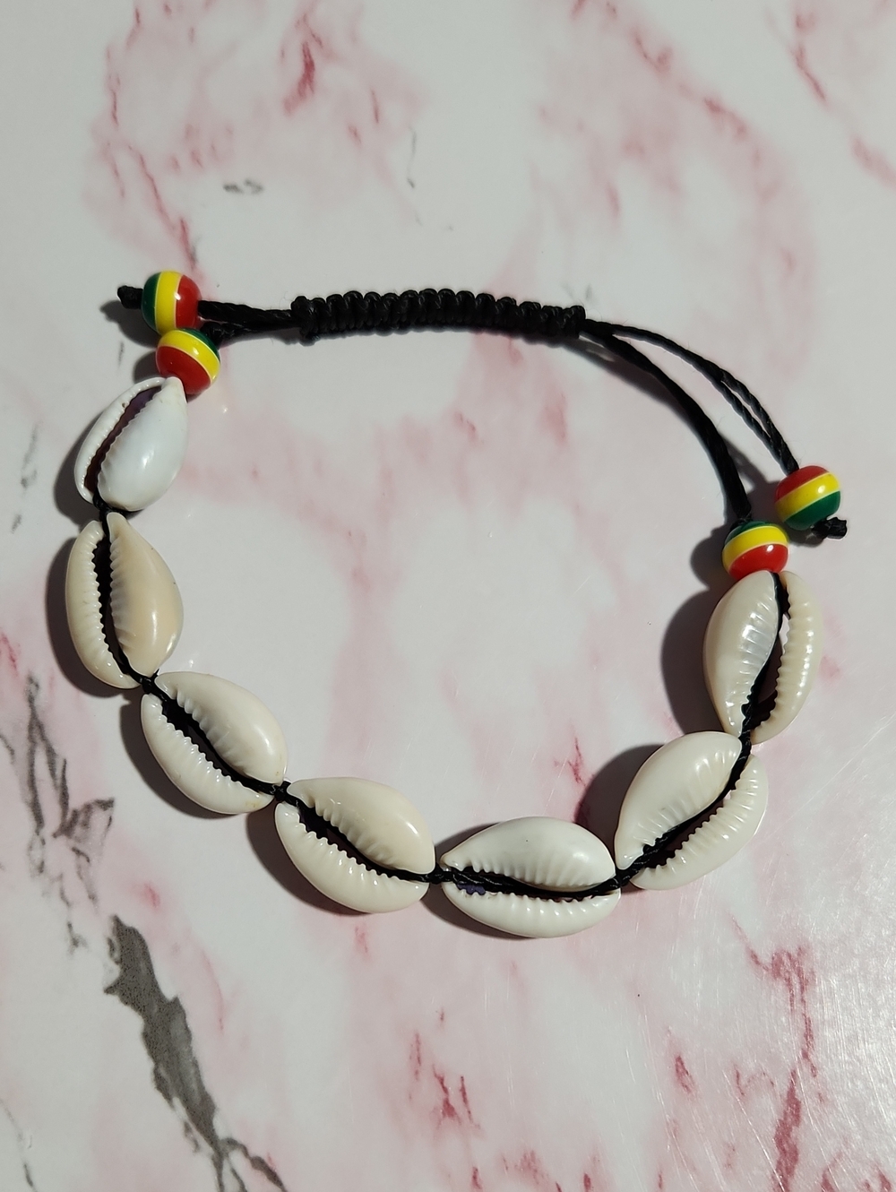 Cowrie Shell Bracelet with Black Cord and Rasta Bead Accents